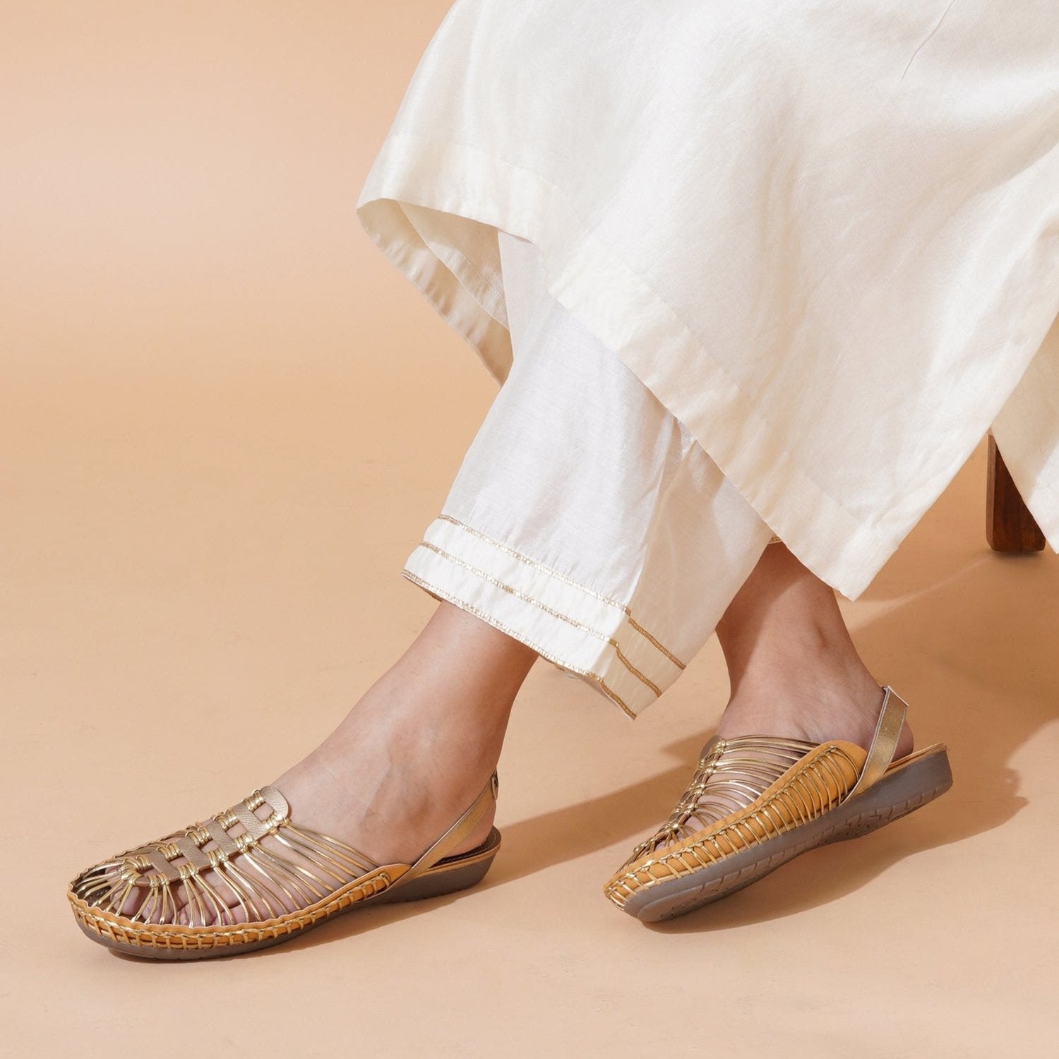 Buy golden handcrafted flat clogs sandal for women online at www.stelway.in